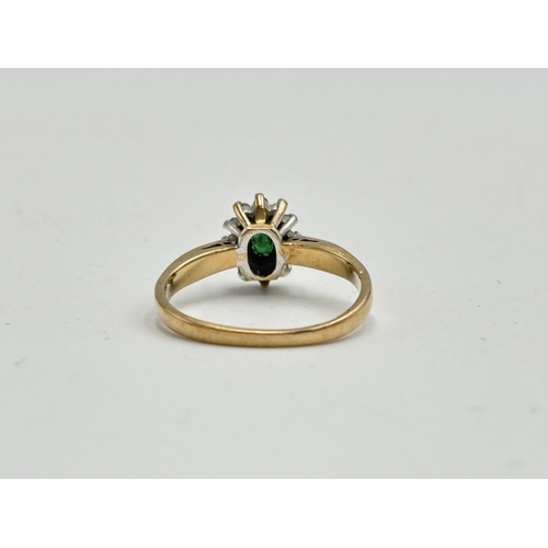 2133D - A hallmarked 9ct gold diamond and emerald ring, size L - approx. gross weight 2.2g