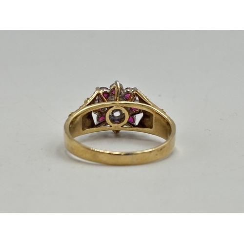 2133F - A hallmarked 9ct gold and ruby ring, size T½ - approx. gross weight 4.2g