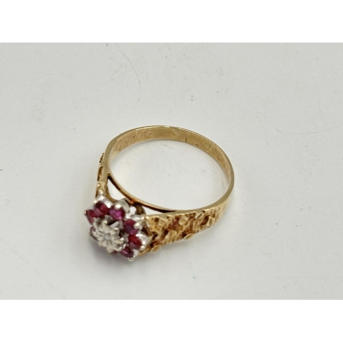 2133F - A hallmarked 9ct gold and ruby ring, size T½ - approx. gross weight 4.2g