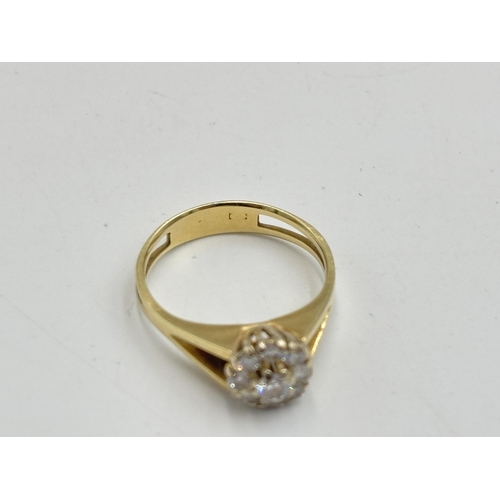 2133H - A hallmarked 14ct diamond daisy ring, size N½ - approx. gross weight 3.25g