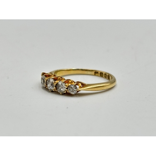 2133K - A hallmarked 18ct gold five stone diamond ring, size K - approx. gross weight 2.65g