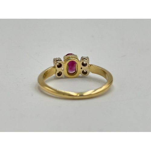 2133M - A hallmarked 18ct gold diamond and ruby ring, size O - approx. gross weight 3.35g