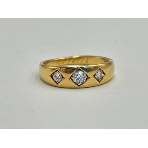 2133O - A Victorian 18ct gold three stone diamond ring, dated 1887, size L½ - approx. gross weight 3.75g