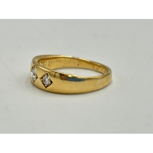 2133O - A Victorian 18ct gold three stone diamond ring, dated 1887, size L½ - approx. gross weight 3.75g