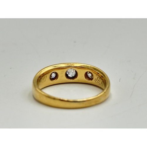 2133O - A Victorian 18ct gold three stone diamond ring, dated 1887, size L½ - approx. gross weight 3.75g