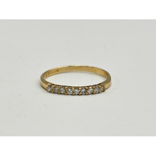 2133Q - A hallmarked 18ct gold nine stone diamond ring, size P - approx. gross weight 1.1g