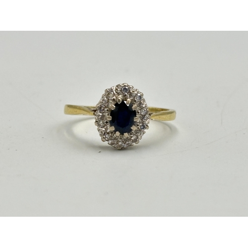 2133R - A hallmarked 18ct gold diamond and sapphire ring, size S½ - approx. gross weight 3.4g