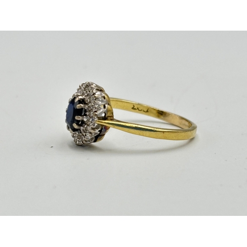 2133R - A hallmarked 18ct gold diamond and sapphire ring, size S½ - approx. gross weight 3.4g