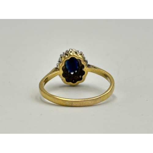 2133R - A hallmarked 18ct gold diamond and sapphire ring, size S½ - approx. gross weight 3.4g