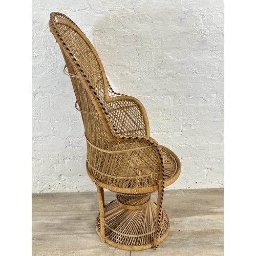 16 - A mid 20th century wicker peacock chair - approx. 114cm high x 70cm wide x 47cm deep