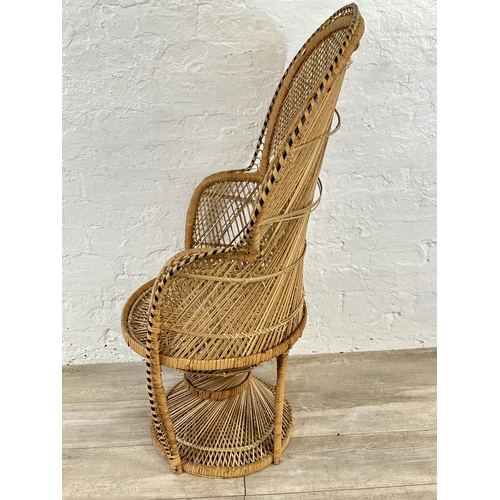 16 - A mid 20th century wicker peacock chair - approx. 114cm high x 70cm wide x 47cm deep