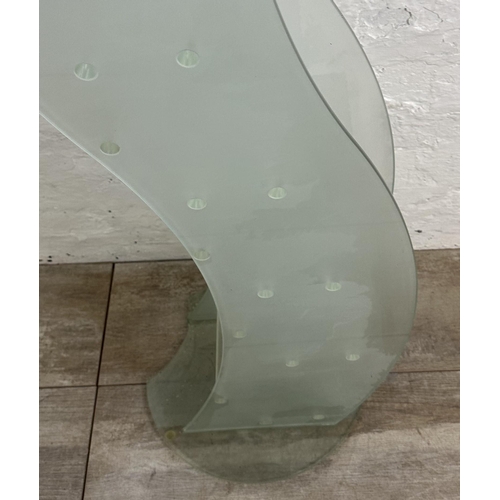 31 - A pair of contemporary glass CD racks - approx. 111cm high