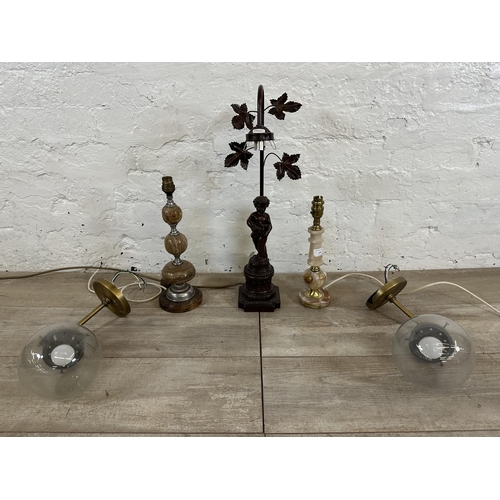 77 - Five pieces of lighting, two contemporary brass effect wall lights, two mid 20th century onyx table ... 