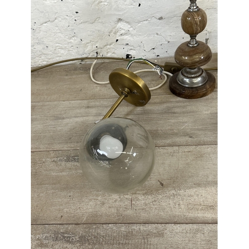 77 - Five pieces of lighting, two contemporary brass effect wall lights, two mid 20th century onyx table ... 