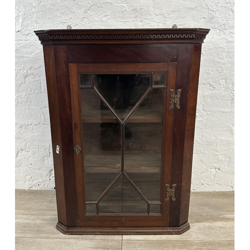 112 - A Georgian carved mahogany wall mountable corner cabinet - approx. 88cm high x 65cm wide x 38cm deep