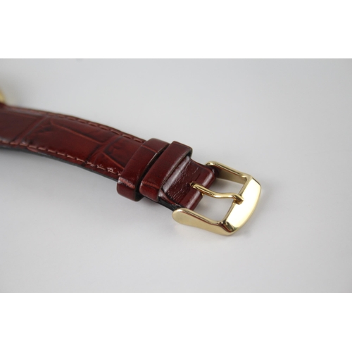 2140 - A mid 20th century Zenith gold plated hand wind men's wristwatch