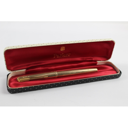 A boxed Parker 61 gold plated fountain pen
