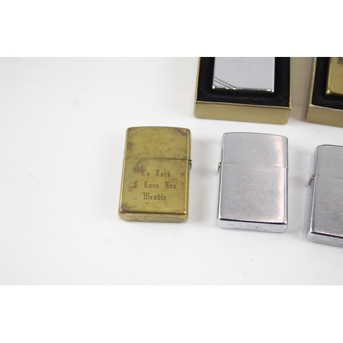 2261 - Nine Zippo cigarette lighters to include Marlboro, brass etc.