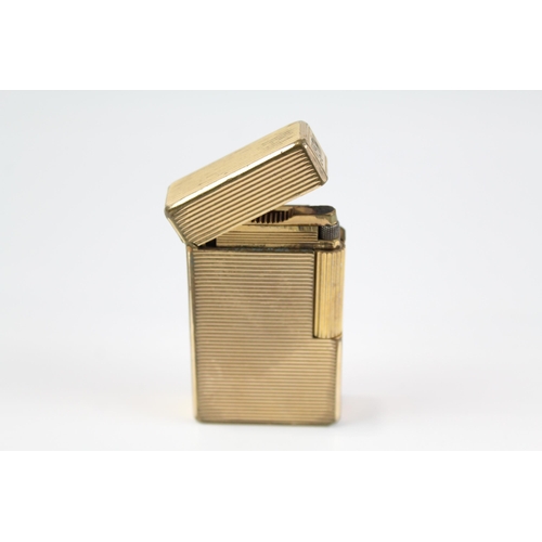 2267 - A mid 20th century St. Dupont gold plated cigarette lighter