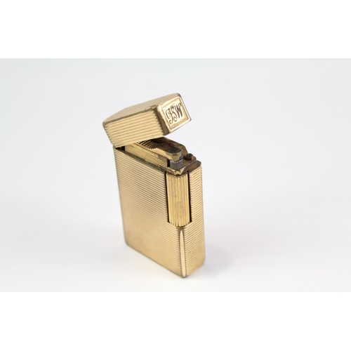 2267 - A mid 20th century St. Dupont gold plated cigarette lighter