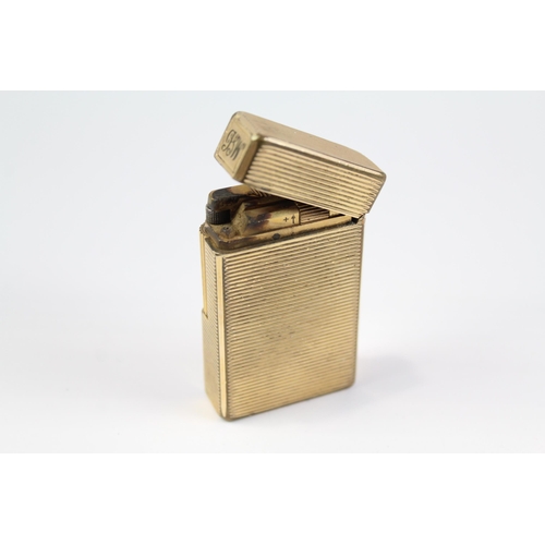 2267 - A mid 20th century St. Dupont gold plated cigarette lighter