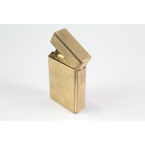 2267 - A mid 20th century St. Dupont gold plated cigarette lighter