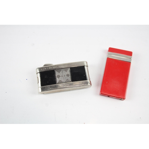 2268 - Two Givenchy cigarette lighters