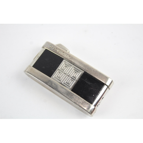 2268 - Two Givenchy cigarette lighters