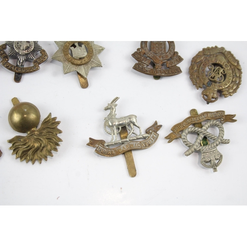 2278 - Ten military cap badges