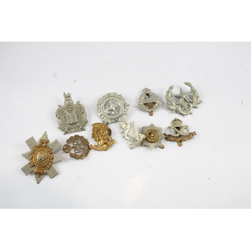 2286 - Ten military cap badges