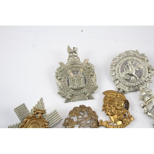 2286 - Ten military cap badges