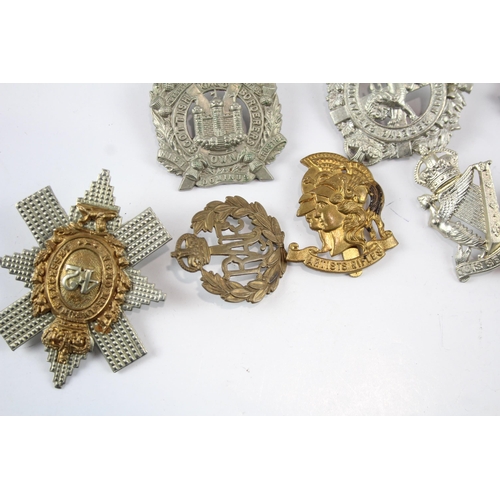 2286 - Ten military cap badges