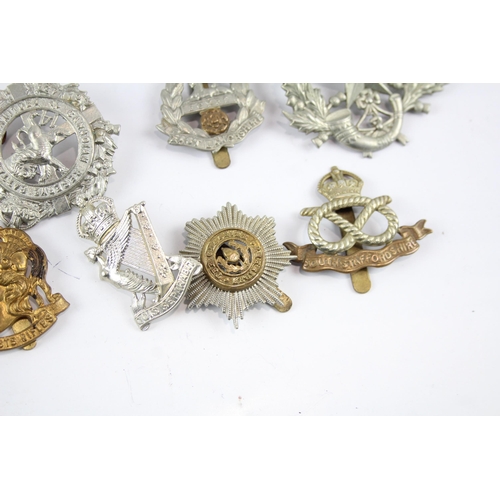 2286 - Ten military cap badges