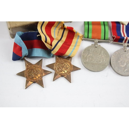 2289 - A boxed WWII medal group comprising 1939-1945 star, Africa Star, Defence and War