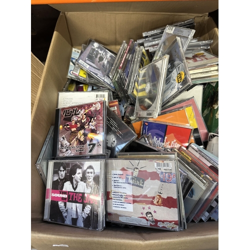 1123 - Three boxes containing books, CDs, tapes etc.