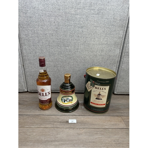 601 - Two bottles of Bell's blended Scotch whisky, one boxed 75cl 1990 Wade Christmas decanter Extra Speci... 