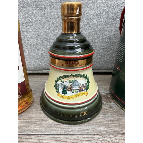 601 - Two bottles of Bell's blended Scotch whisky, one boxed 75cl 1990 Wade Christmas decanter Extra Speci... 