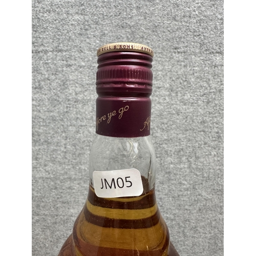 601 - Two bottles of Bell's blended Scotch whisky, one boxed 75cl 1990 Wade Christmas decanter Extra Speci... 