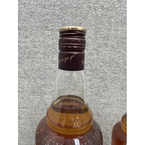 602 - Three bottles of whiskey, one 1L Bell's blended Scotch, one 70cl Bell's blended Scotch Limited Editi... 