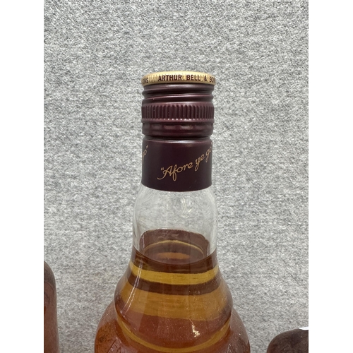 602 - Three bottles of whiskey, one 1L Bell's blended Scotch, one 70cl Bell's blended Scotch Limited Editi... 