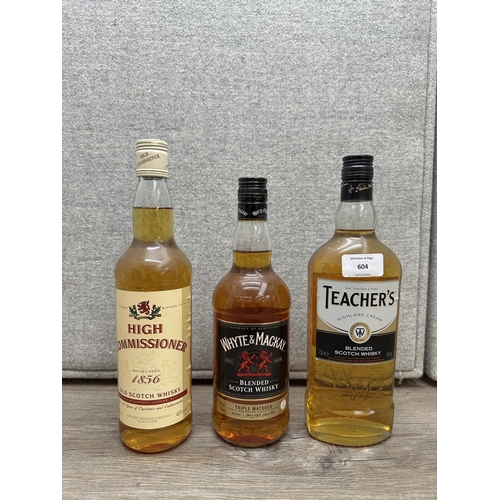 604 - Three 70cl bottles of blended Scotch whisky, one Teacher's Highland Cream, one Whyte & Mackay and on... 