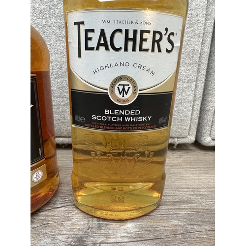 604 - Three 70cl bottles of blended Scotch whisky, one Teacher's Highland Cream, one Whyte & Mackay and on... 