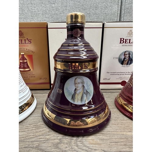 606A - Three boxed 70cl Wade Christmas decanters of Bell's Extra Special Old blended Scotch whisky, 1999, 2... 