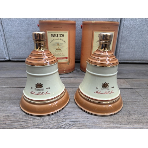 606C - Two boxed 50cl Wade decanters of Bell's Extra Special Old blended Scotch whisky - both bottled at 43... 