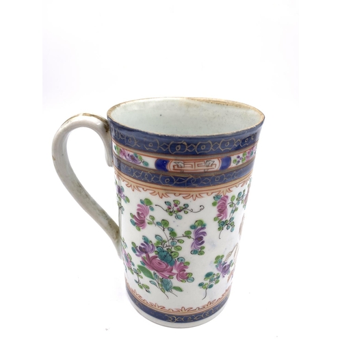 373A - A 19th century hand painted armorial porcelain tankard - approx. 14cm high