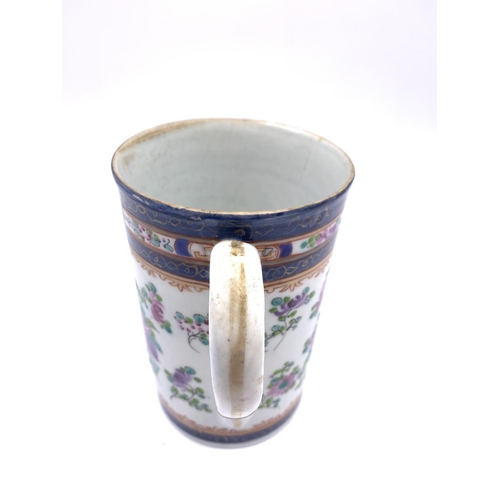 373A - A 19th century hand painted armorial porcelain tankard - approx. 14cm high