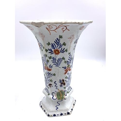 375 - Three antique Delft polychrome floral decorated vases, two approx. 26.5cm high and one approx. 26cm ... 