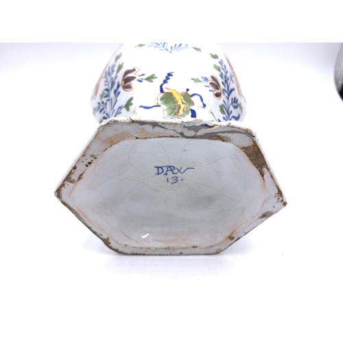 375 - Three antique Delft polychrome floral decorated vases, two approx. 26.5cm high and one approx. 26cm ... 