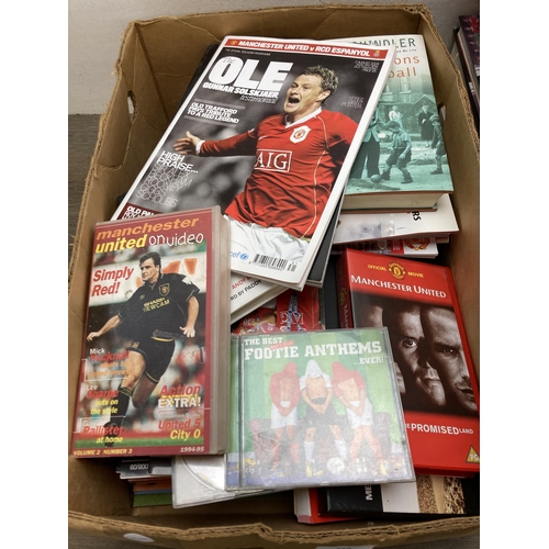 510 - A collection of Manchester United Football Club ephemera to include magazines, hardback books, video... 