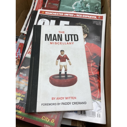 510 - A collection of Manchester United Football Club ephemera to include magazines, hardback books, video... 